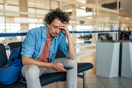 troubled man at the airport