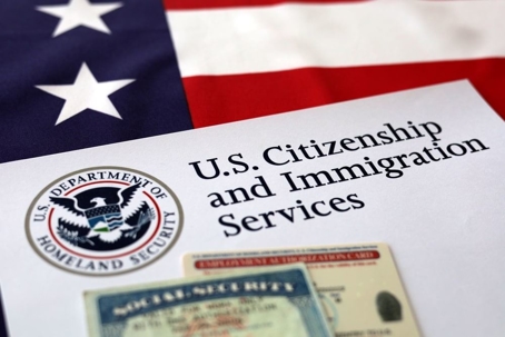 Social security card on top on Citizen and Immigration Papers