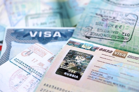 Fragment of Russian Federation visa in passport page close up. Concept of travel and tourism worldwide